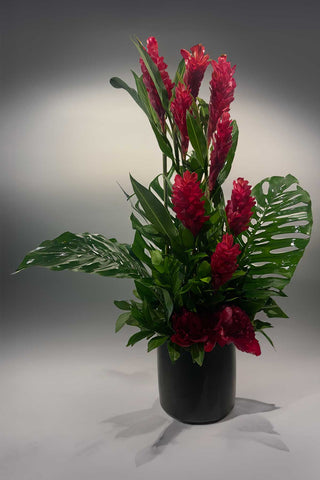 tropical arrangement of all red flowers with gingers