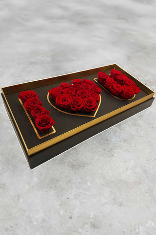 Preserved roses displayed in a luxury box that reads I love you
